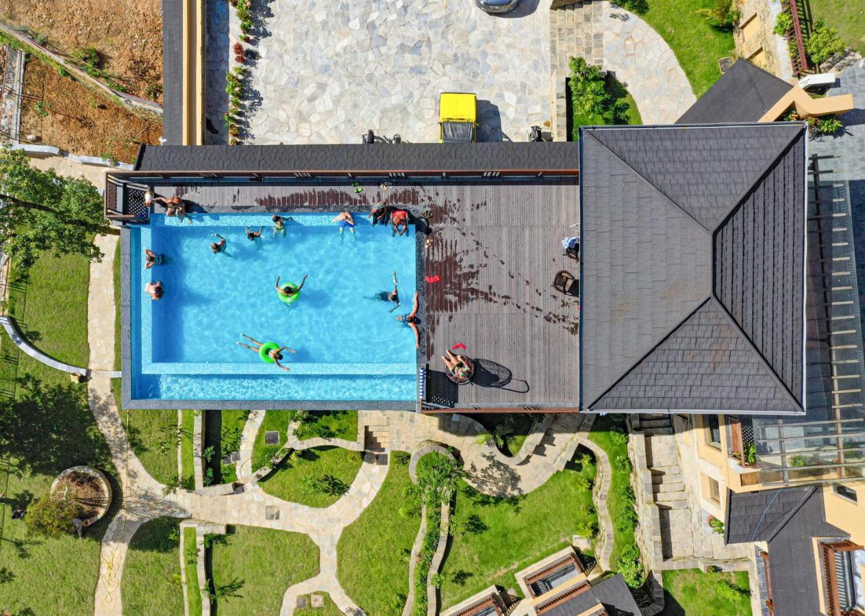 Bar Peepal Resort Похара Екстериор снимка Aerial view of the pool