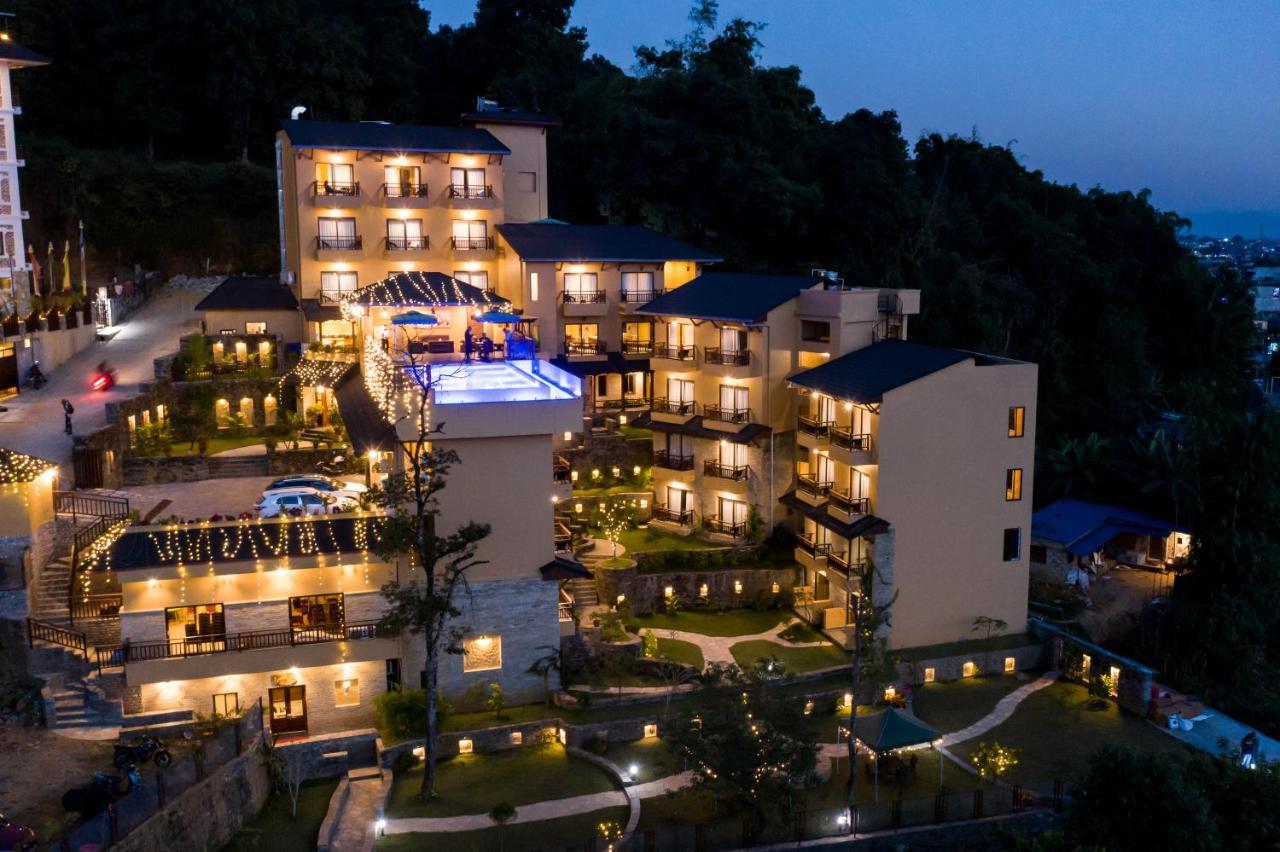 Bar Peepal Resort Похара Екстериор снимка The resort at night