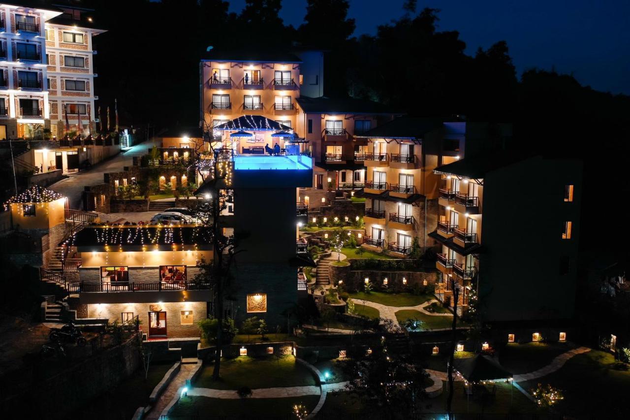Bar Peepal Resort Похара Екстериор снимка The resort at night