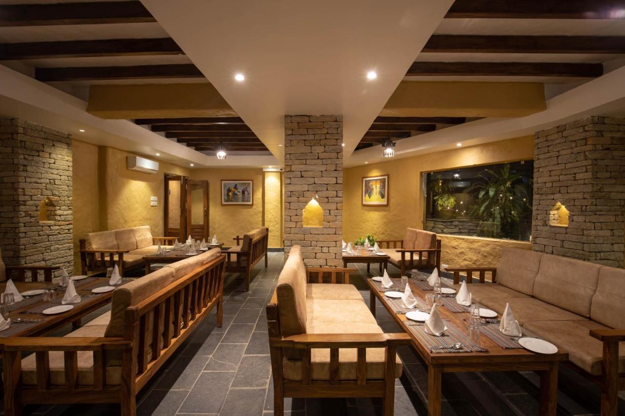 Bar Peepal Resort Похара Екстериор снимка The interior of a restaurant in Kathmandu, Nepal