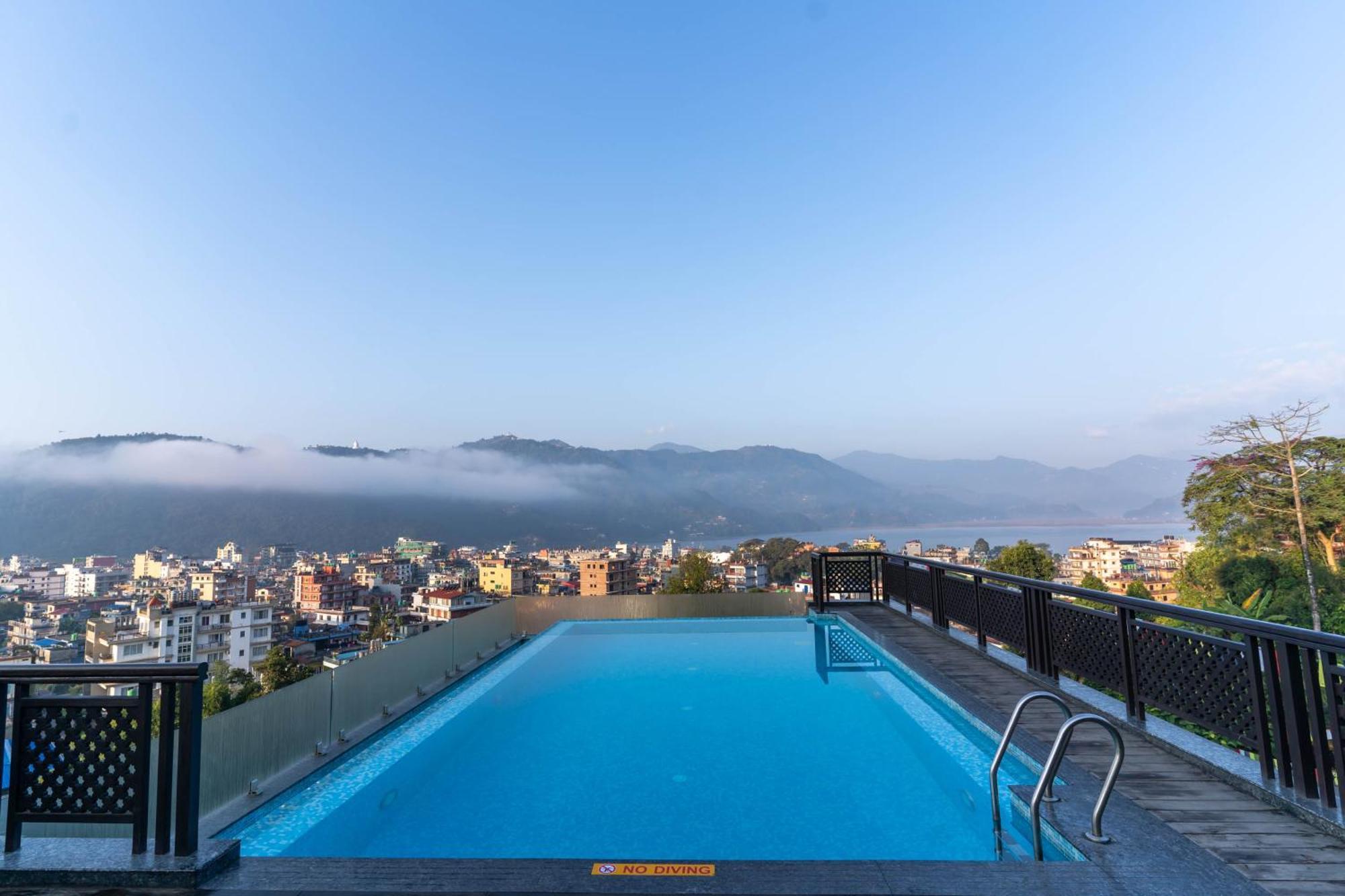 Bar Peepal Resort Похара Екстериор снимка View of the city from the hotel