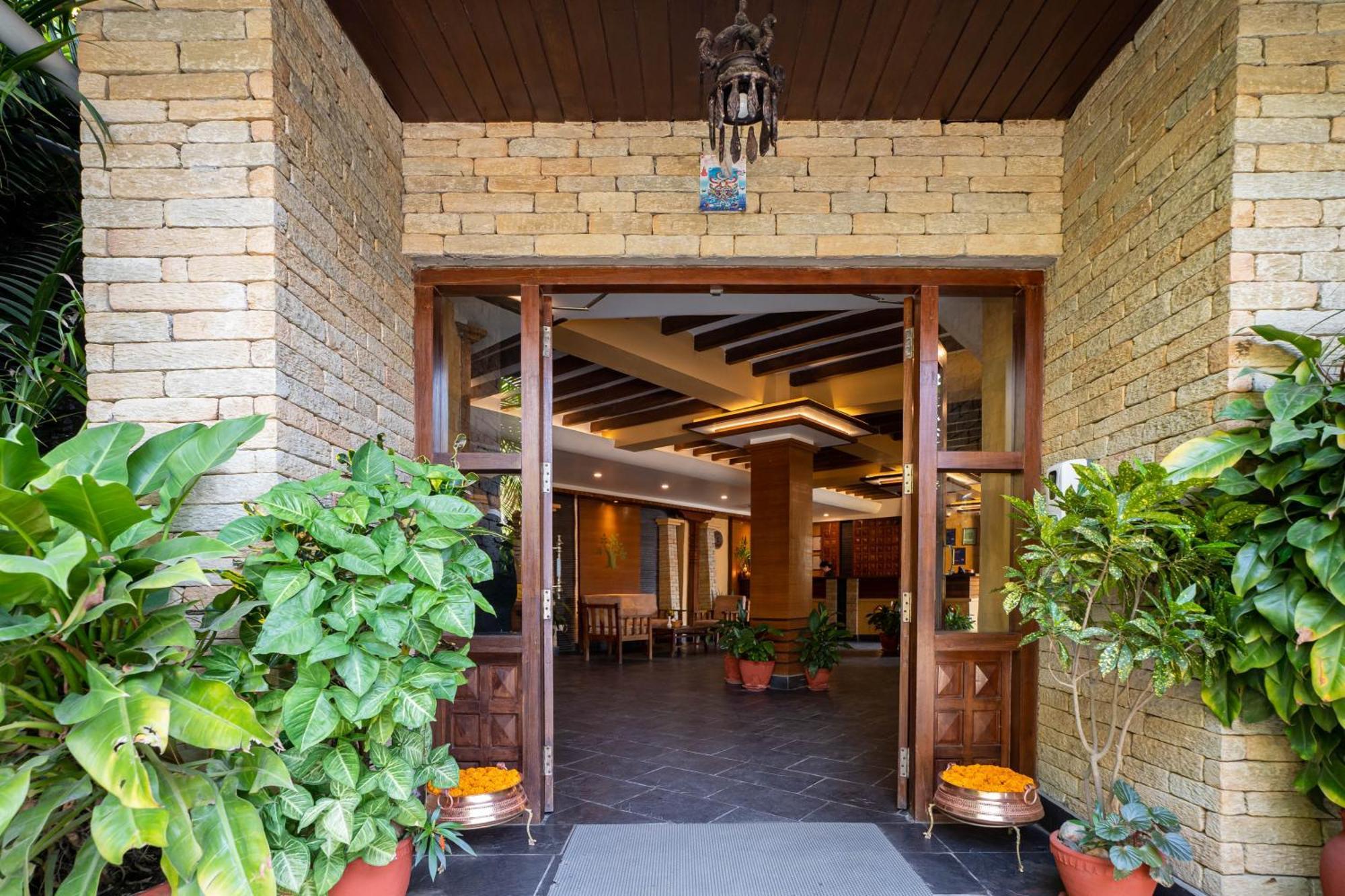 Bar Peepal Resort Похара Екстериор снимка Entrance to the hotel
