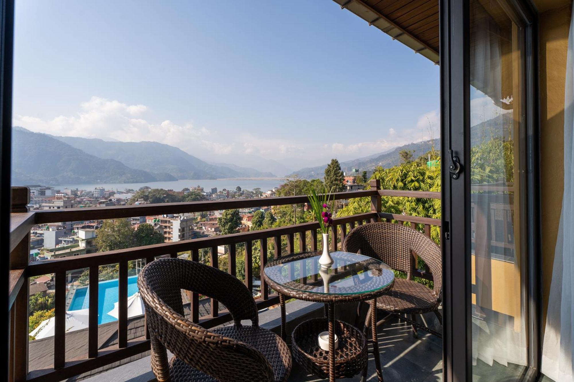 Bar Peepal Resort Похара Екстериор снимка A view of Lake Biwa from a guest room