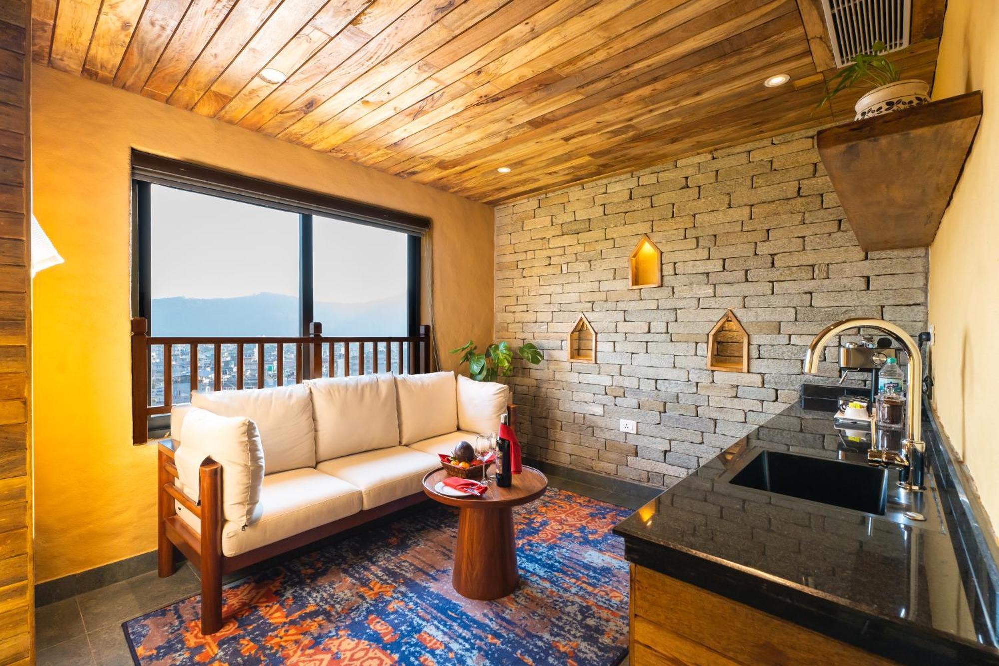 Bar Peepal Resort Похара Екстериор снимка A living room in a typical apartment